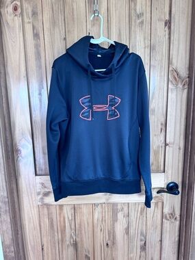 Under Armour Black Hoodie with Neon Coral Logo Outline does have a few snags